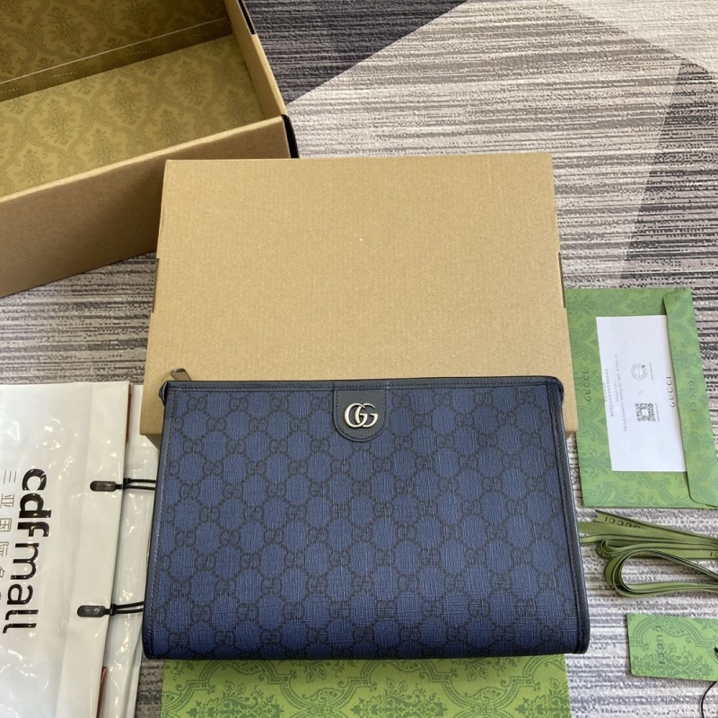 G*u*i clutch bags